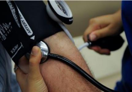 Image of person getting their blood pressure checked.