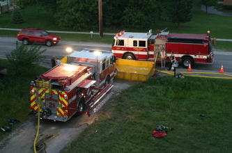 aerial view of 2 fire trucks