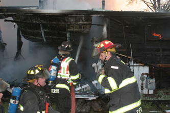firemen fighting a fire